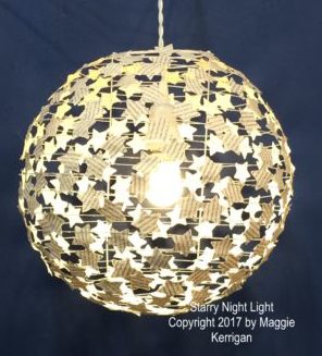 globe lamp made as altered book art by Virginia Beach artist, Maggie Kerrigan
