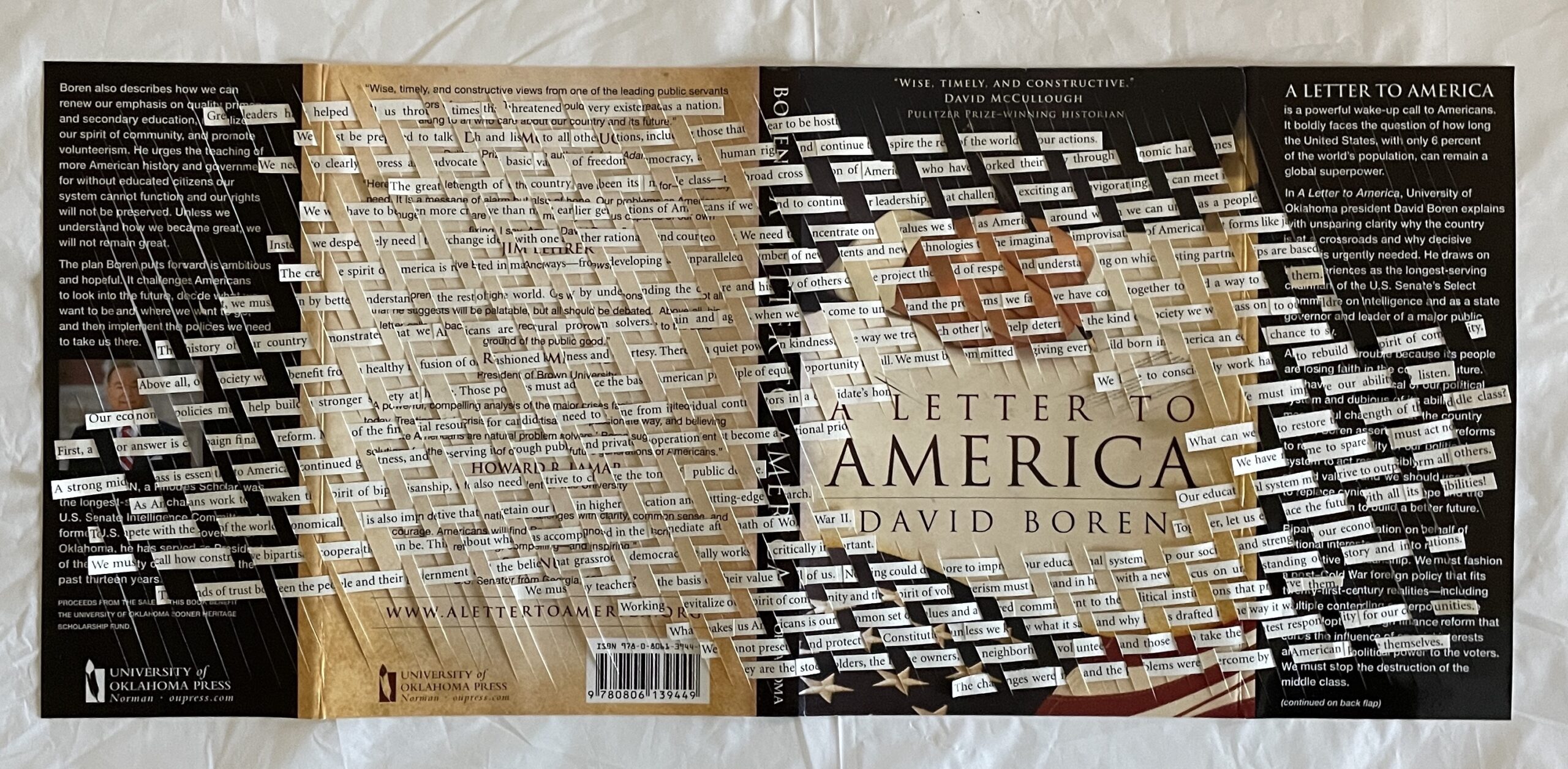 This is an artwork by Maggie Kerrigan that weaves text from the book, A Letter to American into the dust jacket of the book.